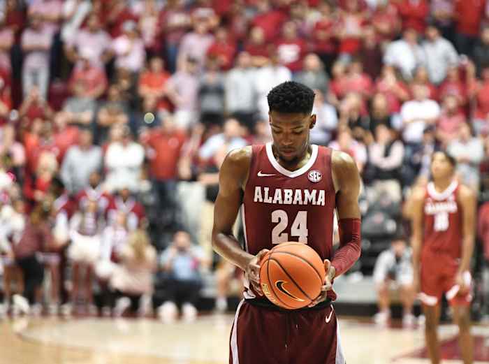 Alabama forward Brandon Miller (24) comes to the free throw game in overtime at Coleman Coliseum. Alabama defeated Auburn 90-85 in overtime to claim the regular season SEC Championship.